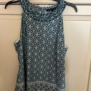 White House Black Market sleeveless beautiful top with accent crystals.